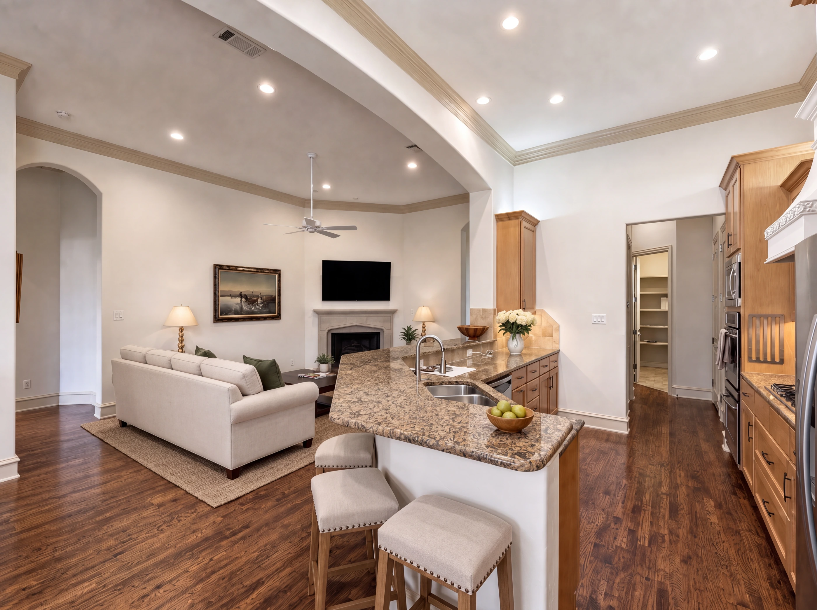 Kitchen with curved granite breakfast bar